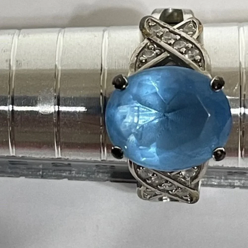Blue topaz and silver ring.